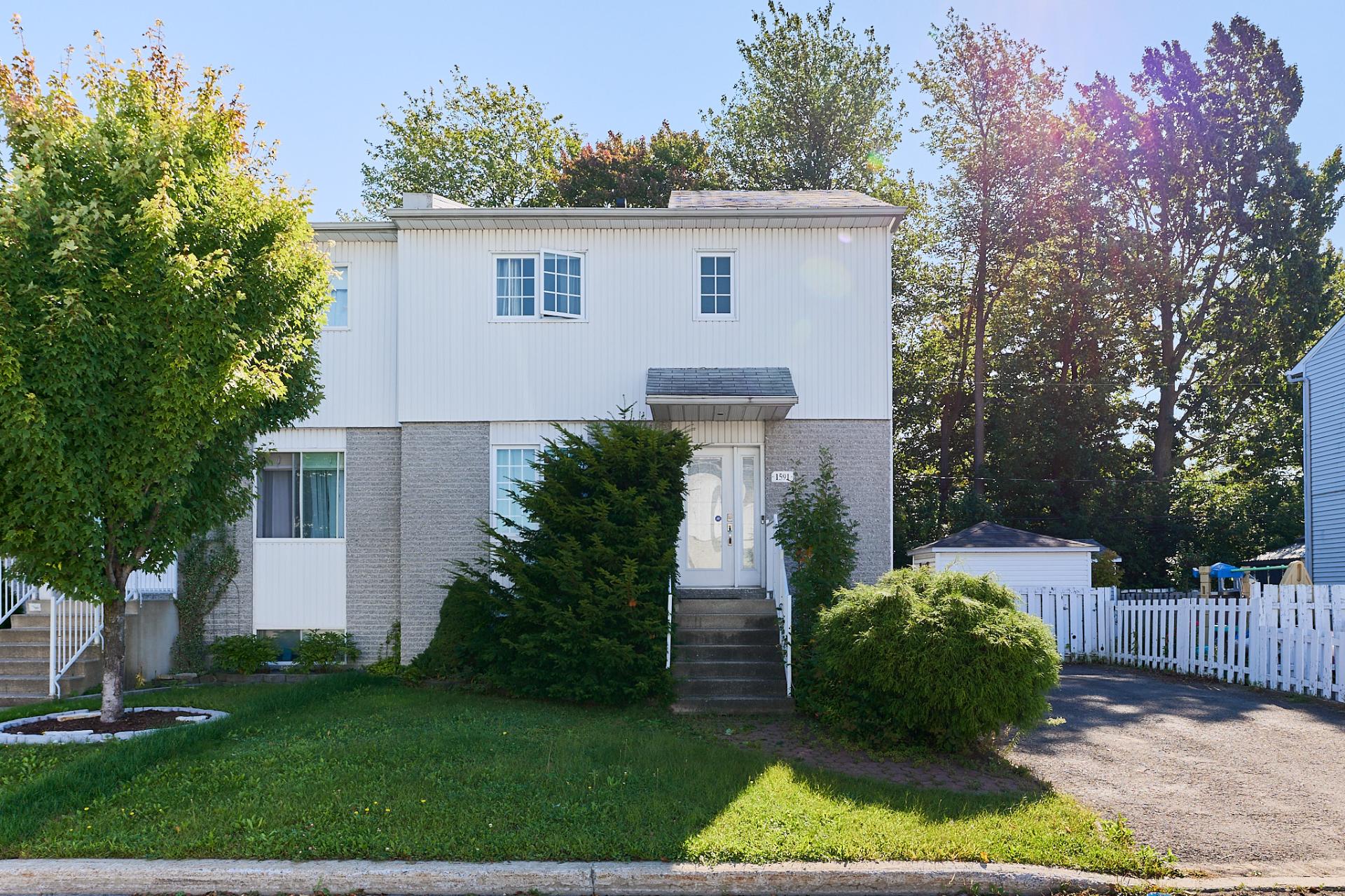 1591 Rue des Bégonias — photo 1