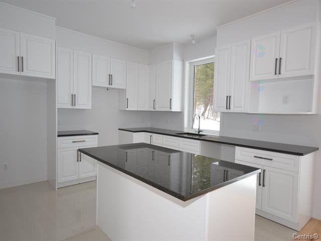 215 Rue St-Exupéry — photo 2