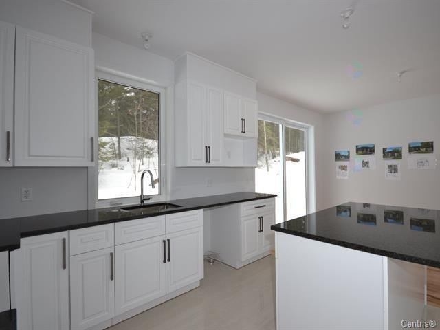 220 Rue St-Exupéry — photo 3